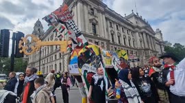 Creative protesters wheel giant model of the Jenin Horse through London on Nakba anniversary march