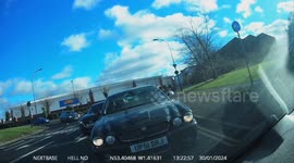 Car accident car in outside lane cutting corner scraping vehicle at side