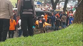 Indonesia: Evacuating the bodies of victims of a crashed trainer plane in South Tangerang
