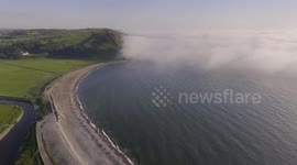 Aerial video of a sea mist hitting the coastal town of Aberystwyth in West Wales.