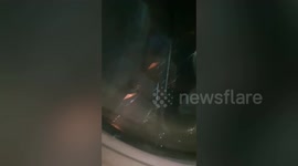 Plane engine bursts into flames mid-air forcing emergency landing