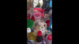 Watch street food dessert made from ice shavings being served