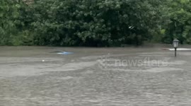 China floods submerge cars amid heavy rain