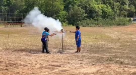 Locals shoot spinning double helix rocket into the sky in annual rainmaking festival