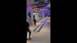 Bowling noob scores a perfect strike... of UTTER EMBARRASSMENT