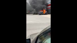 Vehicle fire erupts near store in Davenport