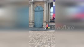 Food protesters vandalise French National Assembly with orange paint