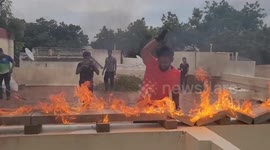 Taekwondo master enters Guinness World Records by smashing flaming concrete blocks