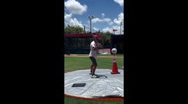 Baseball player hits an epic basketball shot from the pitching mound