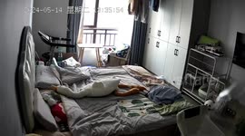 Cozy cat stretches out on bed after a perfect nap