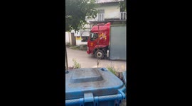 Truck bounces uncontrollably while parked in China