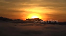 The sun rose with thick clouds on the eastern horizon above the Toraja sky in its splendor