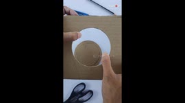Give your glass bottles a second life with a DIY cardboard vase tutorial