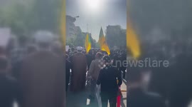 Iran: Iraqi Militia Flag Flies At Iranian President's Funeral
