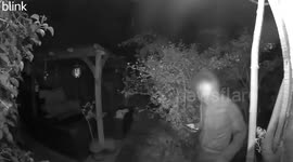 Frightened woman catches stranger lurking outside home in middle of the night