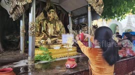 Myanmar's pilgrims flock to participate in traditional Kason water pouring festival