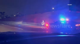USA: Motorcycle Pursuit on 10 Freeway in Bassett, LA