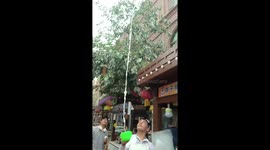 Yoghurt seller hurls dish in the air before serving customers
