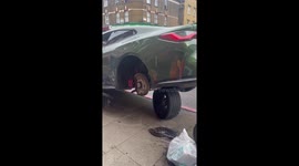 Car accident leaves vehicle sitting on displaced wheel