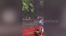Egg-sized hail hits northern China causing severe flooding