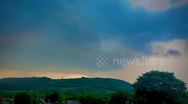 Dramatic moment lightning struck a mountain in Wales