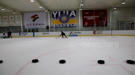 Russian hockey professionals help hone skills of Chinese children