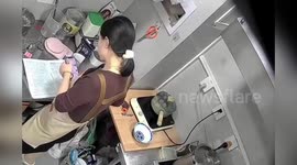 Restaurant calls police over 'employee spying on secret cookbook' in China