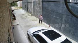Elderly woman organises neighbours to catch falling child plunging from balcony