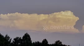 USA: Storm Clouds Move Over Frisco, TX Against The Setting Sun