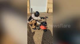 Dad turns Henry Hoover into mini-motorbike he rides around city