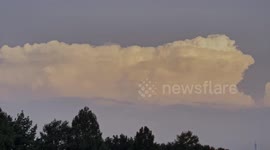 Storm Clouds Set Against The Setting Sun in 4K HDR