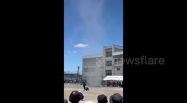 Japan: Dust Devil Sweeps Across Schoolyard During Sports Festival