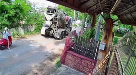 Cement truck rolls backward onto woman's motorcycle