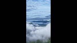 Qinling Mountains shrouded in swirling clouds