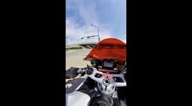 Biker buys red rose from street vendor in Austin