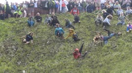 US woman Abby Lampe WINS Women’s Cheese Rolling race for second time