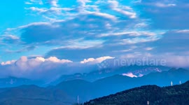 China: Moving Cloud Waterfall at Sunset in Jinfo Mountain in Chongqing