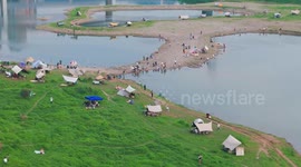 China: Tourists Play on The Yangtze River Beach in Chongqing