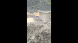 Truck topples into gorge following landslide induced by Cyclone Remal in eastern India