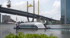 Solar-powered garbage collecting raft made by Dutchman helps clean Bangkok's river