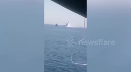 China Coast Guard hits Filipino fishermen's boat with water cannon