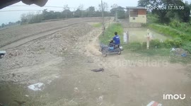 Motorcycle mishap: Rider takes dive into pond