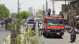 India records temperature at 50 degrees; Municipal council initiates relief from sweltering heat with fire extinguishing vehicle in India