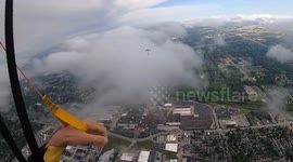 USA: U.S. Army Parachute Team Soars with American Flag Over 108th Indy 500