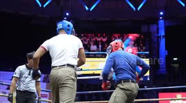 Strong arms of the law! Policeman have boxing tournament in Bangkok