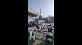 Schoolchildren exercise on oil drums in China