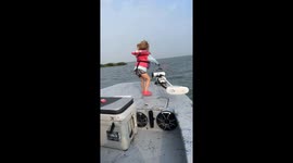 Can she hang on? Little girl battles to reel in strong fish
