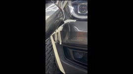 Man uses boiling water to fix a car with a dent