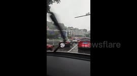 Driver's Manual Ingenuity During Torrential Rain Captured in Southeast China