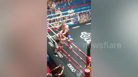 Mass brawl erupts in the ring as boxer taunts loser after judge's decision